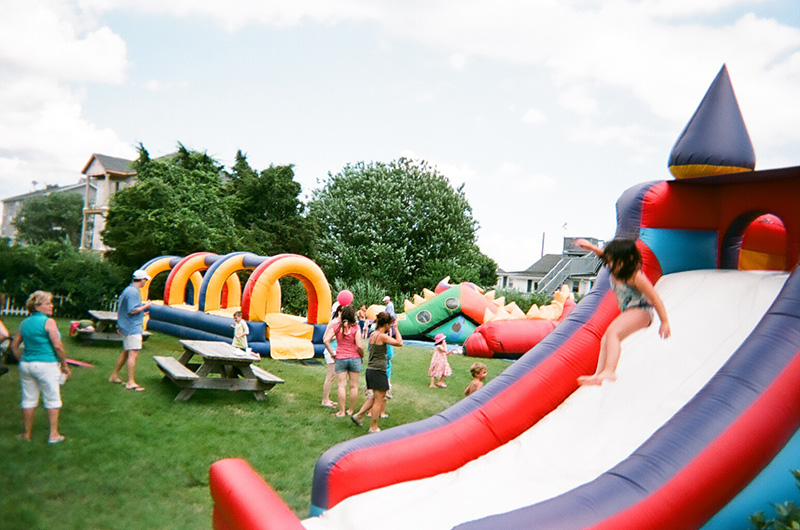 Children slide down the Castle